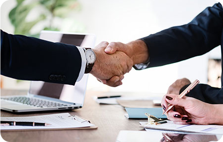 Business people shaking hands make a deal