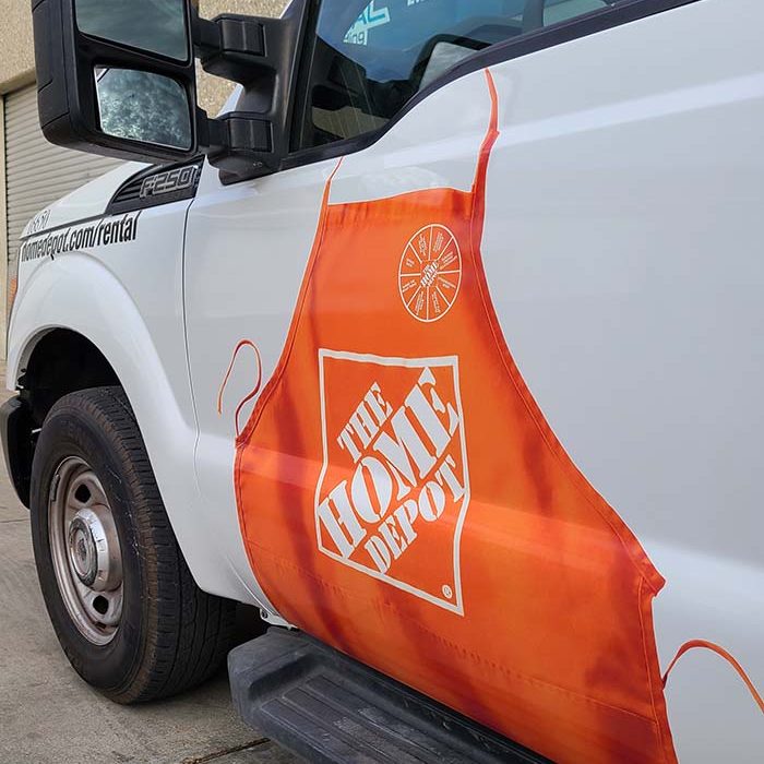 Image of the driver side door of The Home Depot Vehicle Wrap